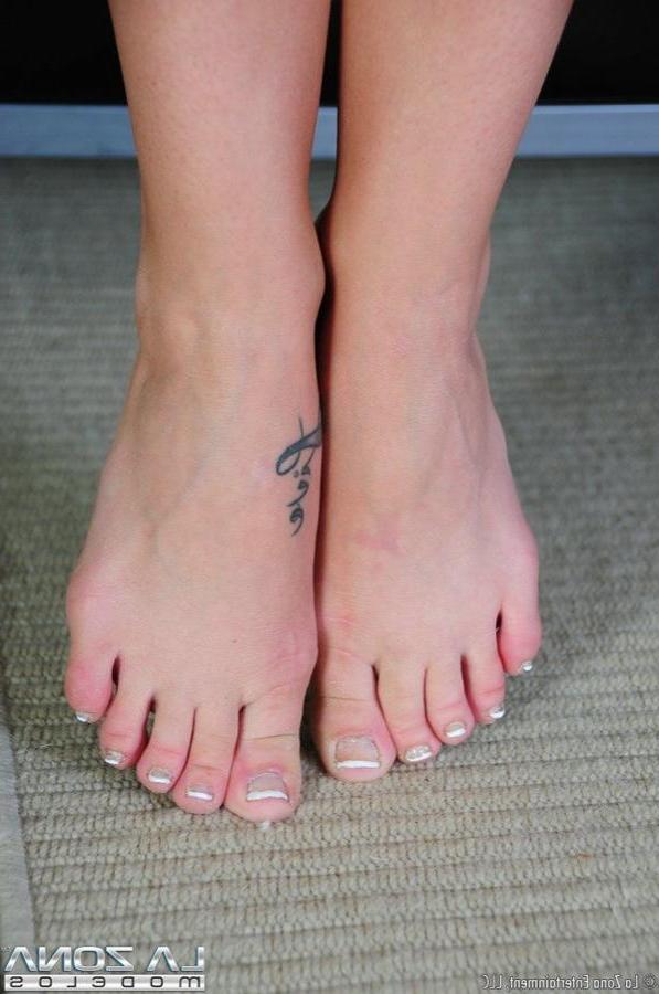 15P Rachel slides her naked petite body all over the leather couch