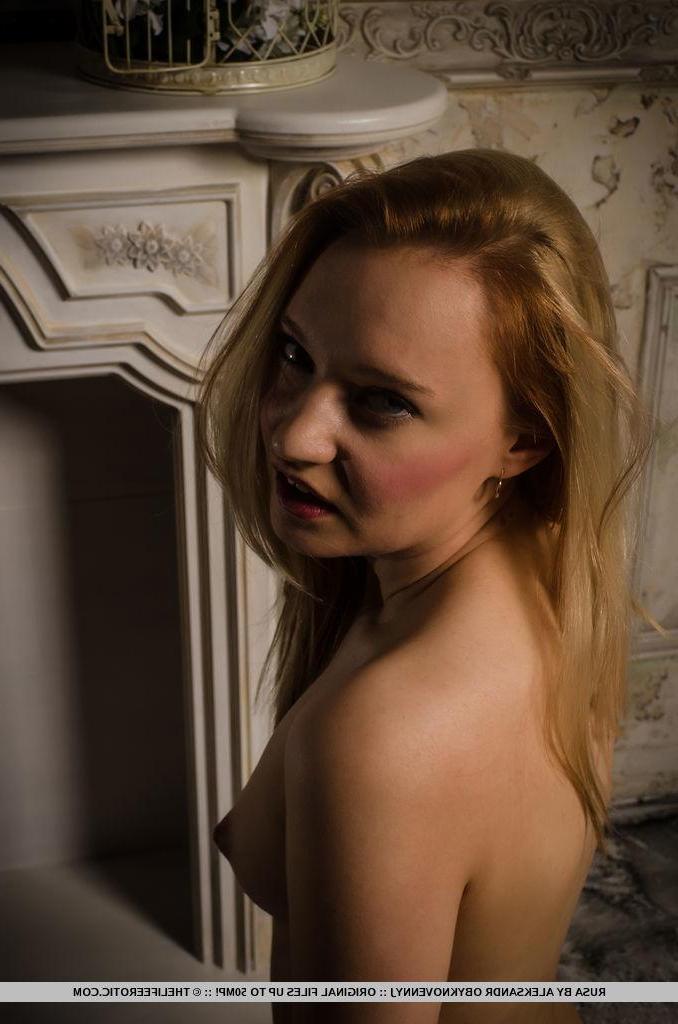 16P Erotic model Rusa lifts her black dress to fondle her wet pussy