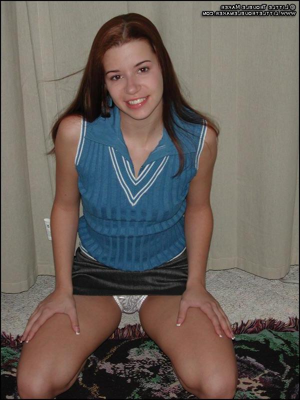 20P Pictures of teen babe Little Troublemaker getting naked for your cock