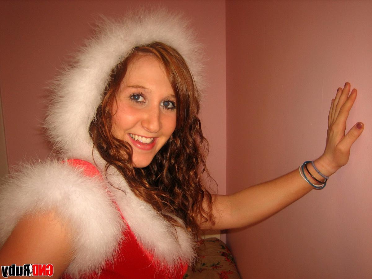 12P GND Ruby has a Christmas surprise as she strips naked and fingers her tight little teenage pussy