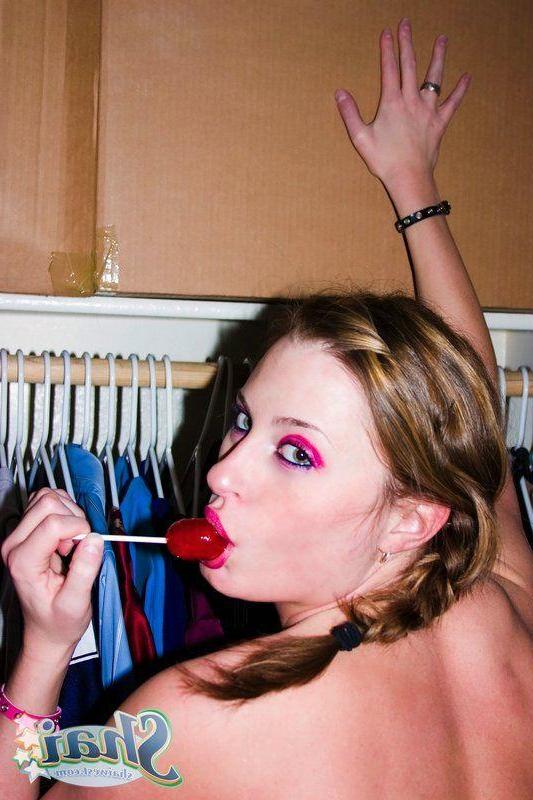 20P Pictures of teen hottie Shai West sucking on a lollipop