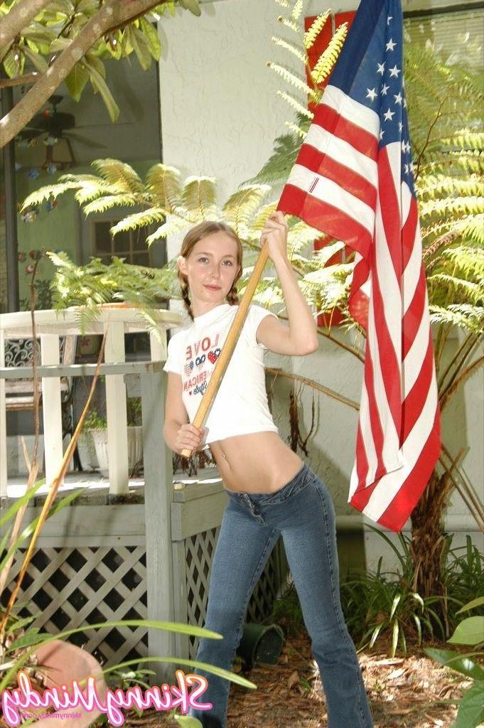 20P Pictures of Skinny Mindy doing some sexy flag waving