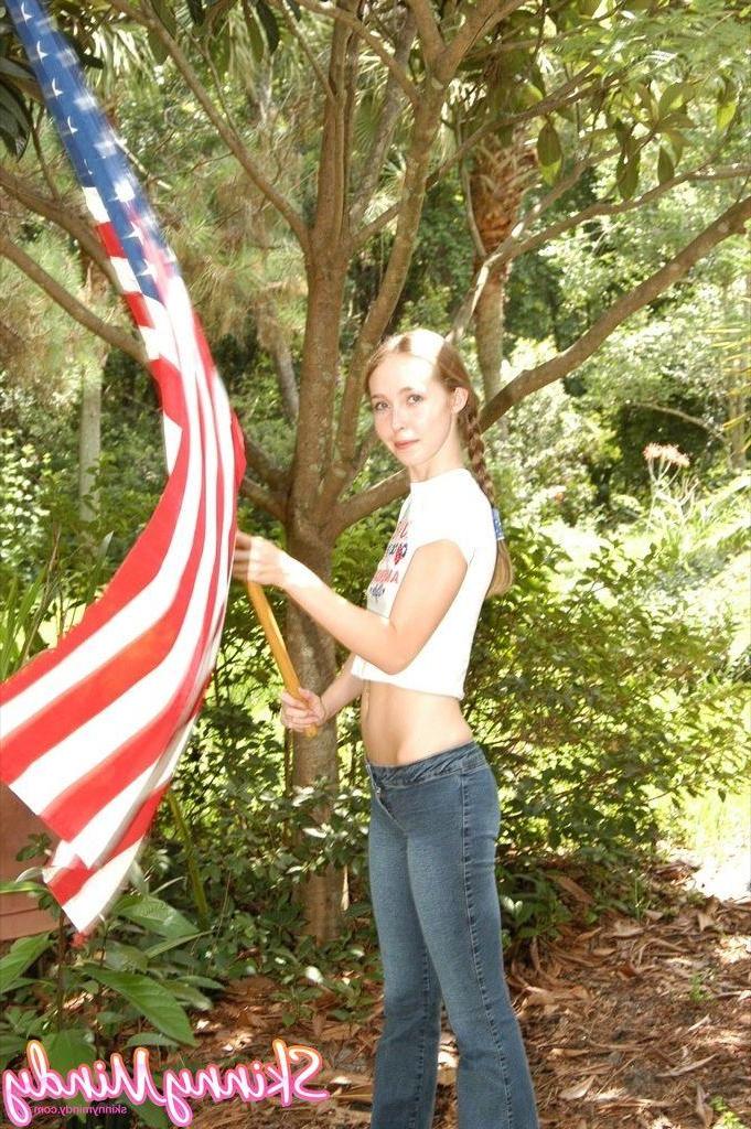 20P Pictures of Skinny Mindy doing some sexy flag waving