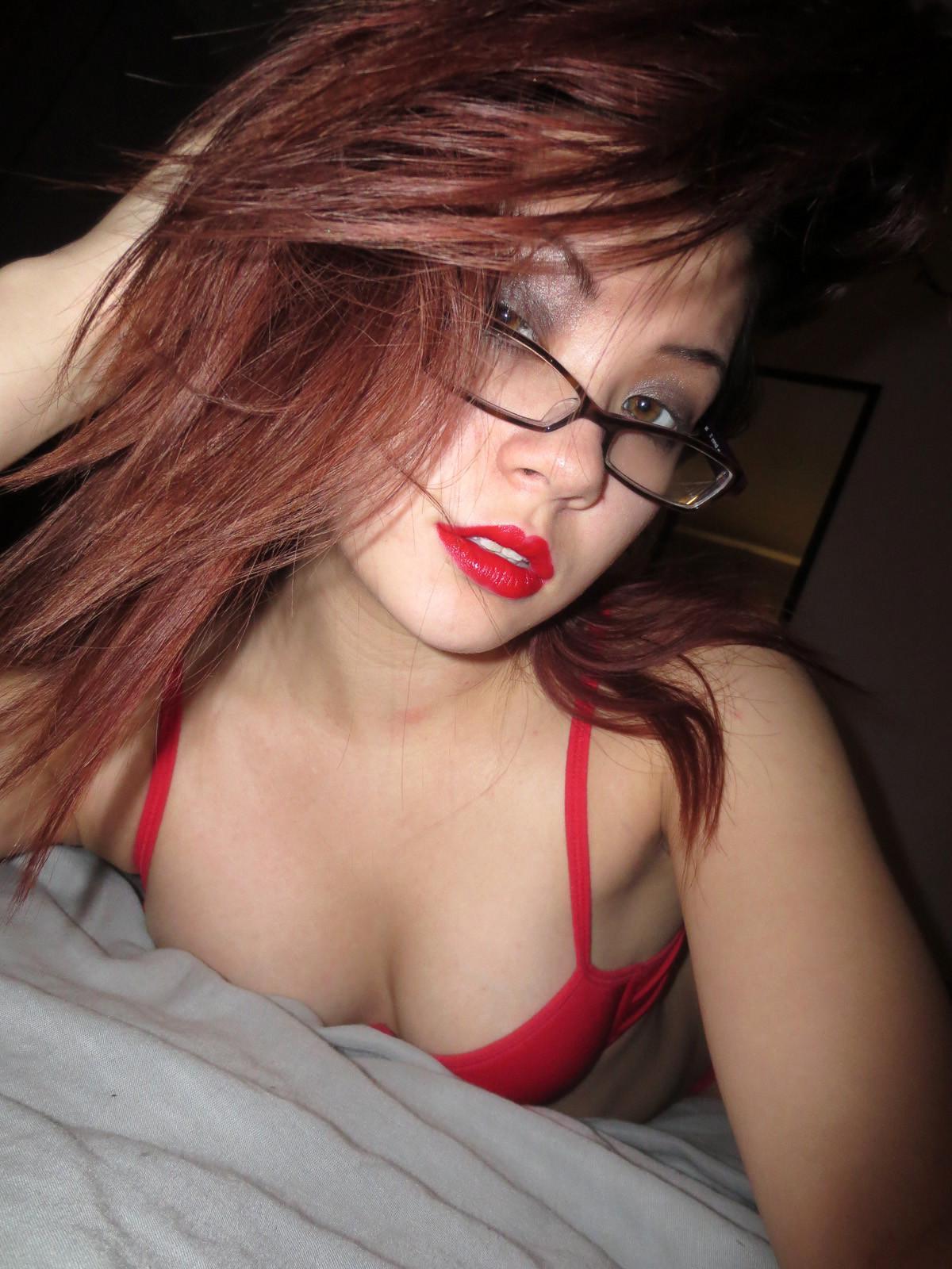 15P Asian beauty Sydney Mai rolls around in her stockings and takes some selfies