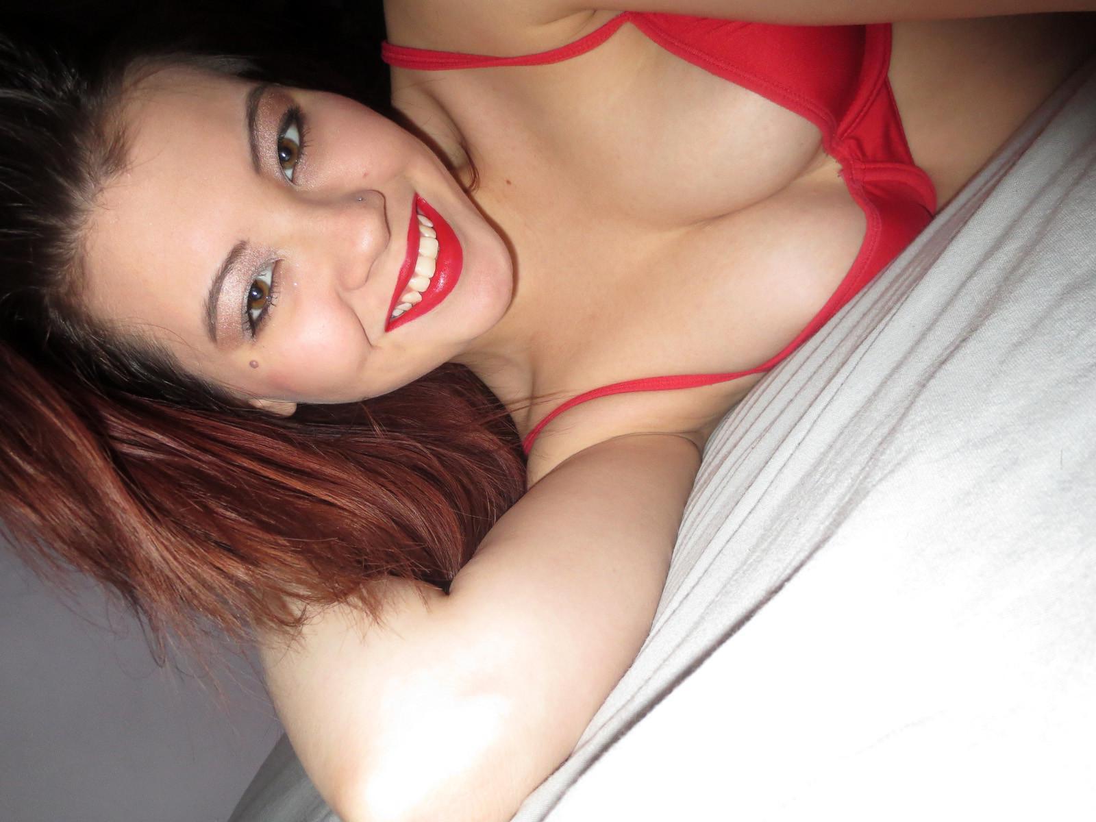 15P Asian beauty Sydney Mai rolls around in her stockings and takes some selfies