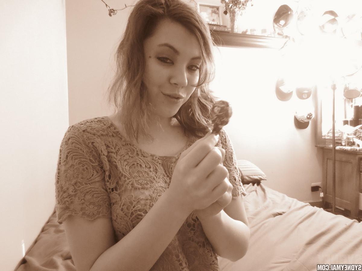 15P Beautiful asian girl Sydney Mai teaess with a lollipop