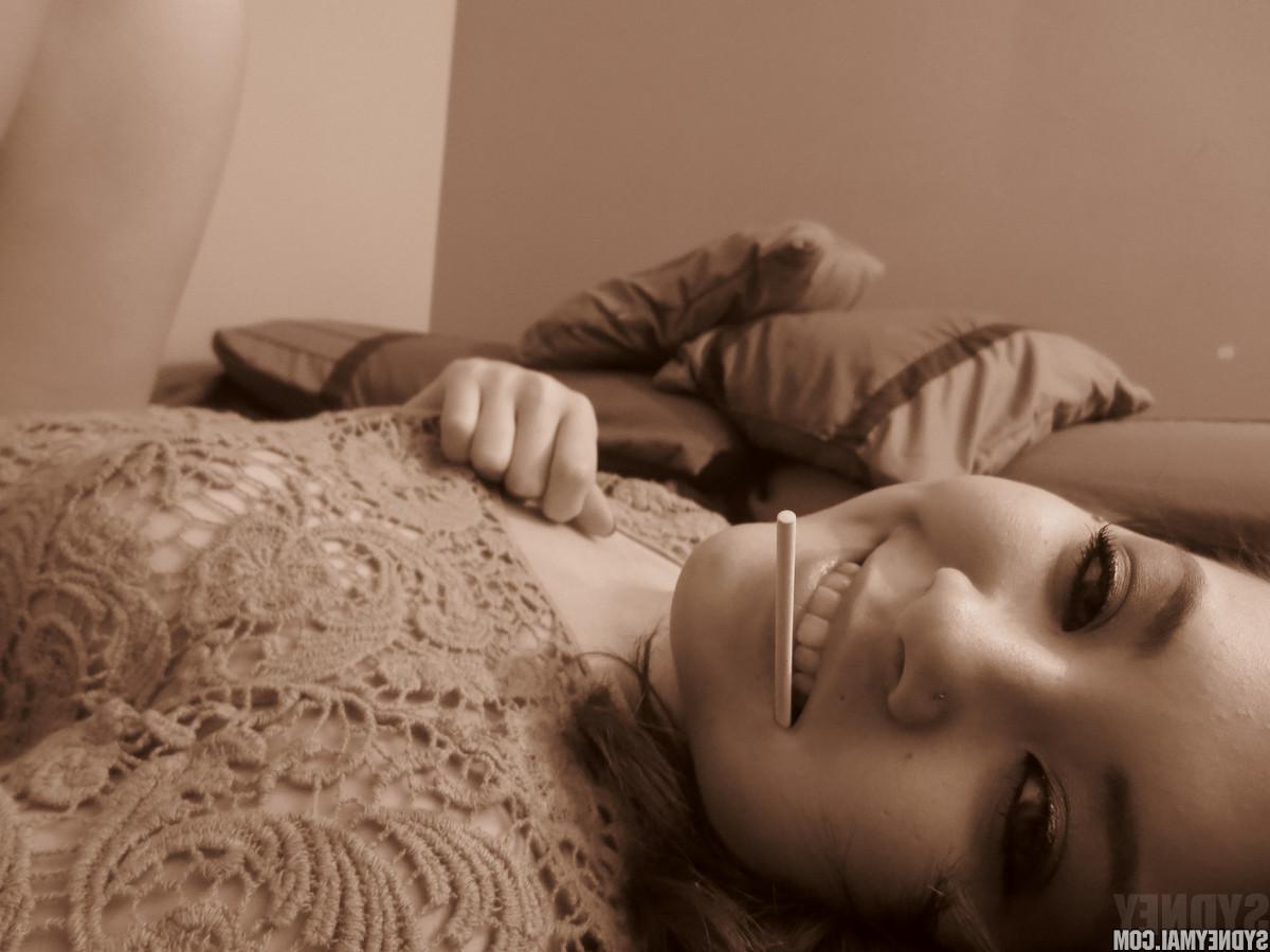 15P Beautiful asian girl Sydney Mai teaess with a lollipop
