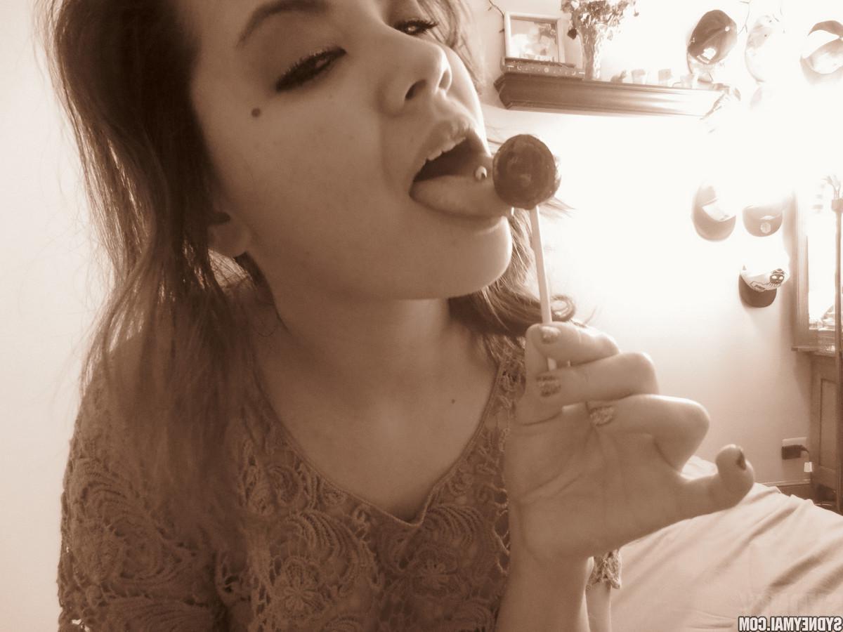 15P Beautiful asian girl Sydney Mai teaess with a lollipop