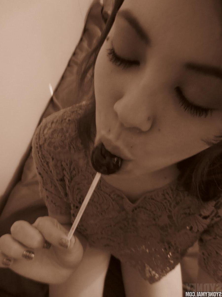 15P Beautiful asian girl Sydney Mai teaess with a lollipop