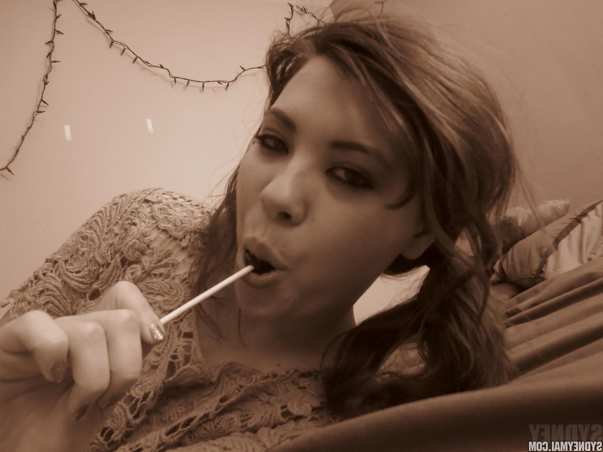 15P Beautiful asian girl Sydney Mai teaess with a lollipop