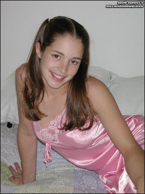 20P Pictures of Tawnee Stone stripping in bed