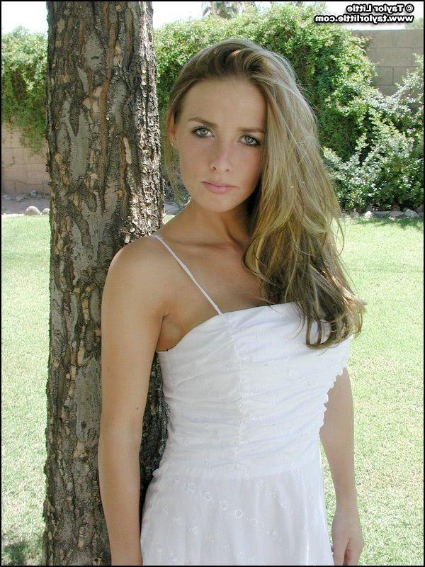 20P Pictures of teen hottie Taylor Little stripping by a tree