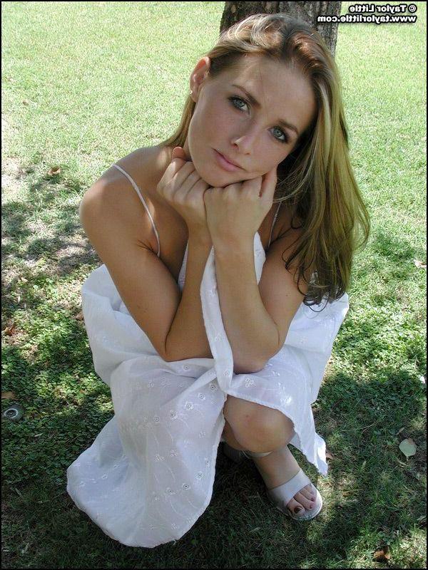 20P Pictures of teen hottie Taylor Little stripping by a tree