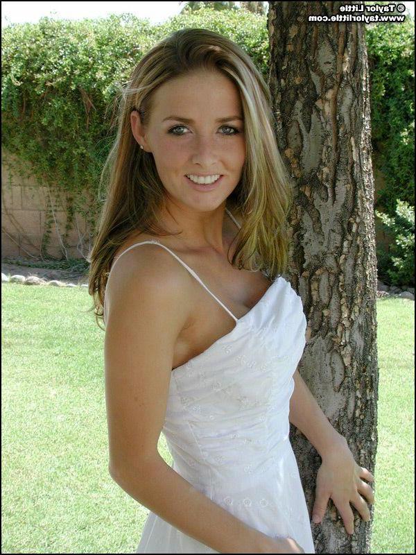 20P Pictures of teen hottie Taylor Little stripping by a tree