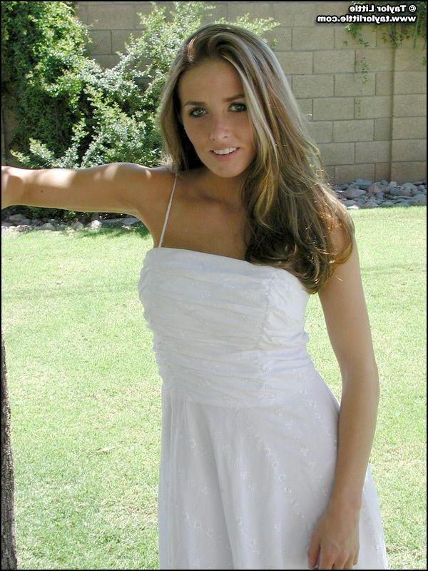 20P Pictures of teen hottie Taylor Little stripping by a tree