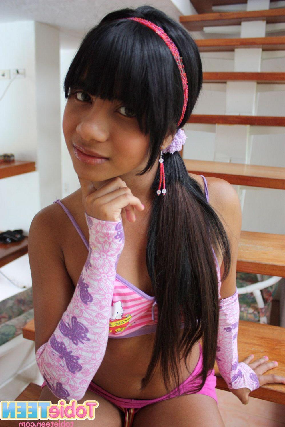 12P Pictures of Tobie Teen showing her fuckable body