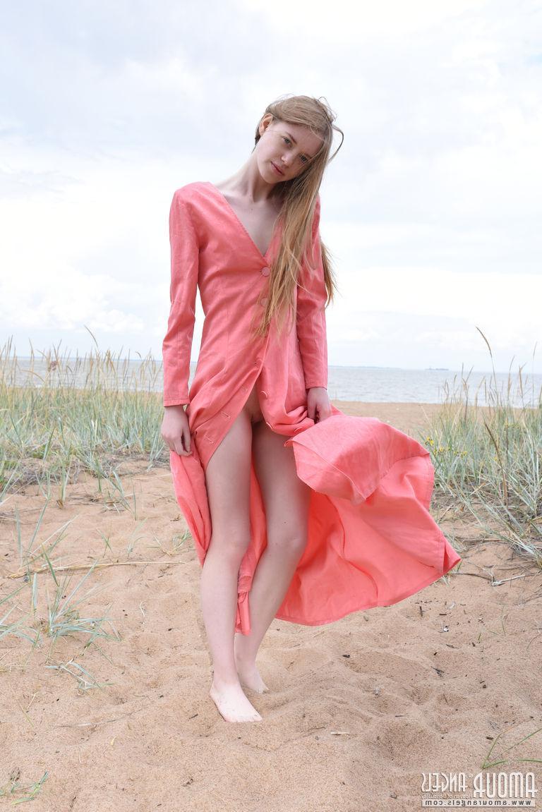 20P Beautiful girl Gerda gives you her tight pussy on the beach