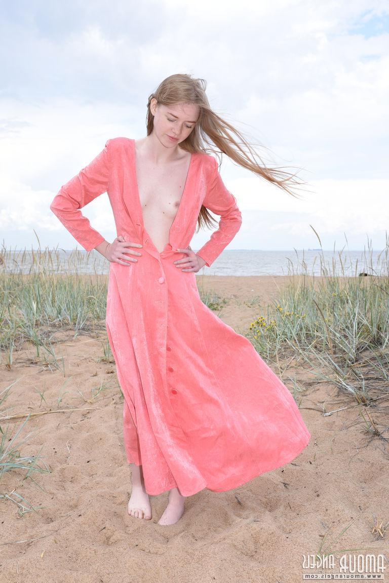 20P Beautiful girl Gerda gives you her tight pussy on the beach