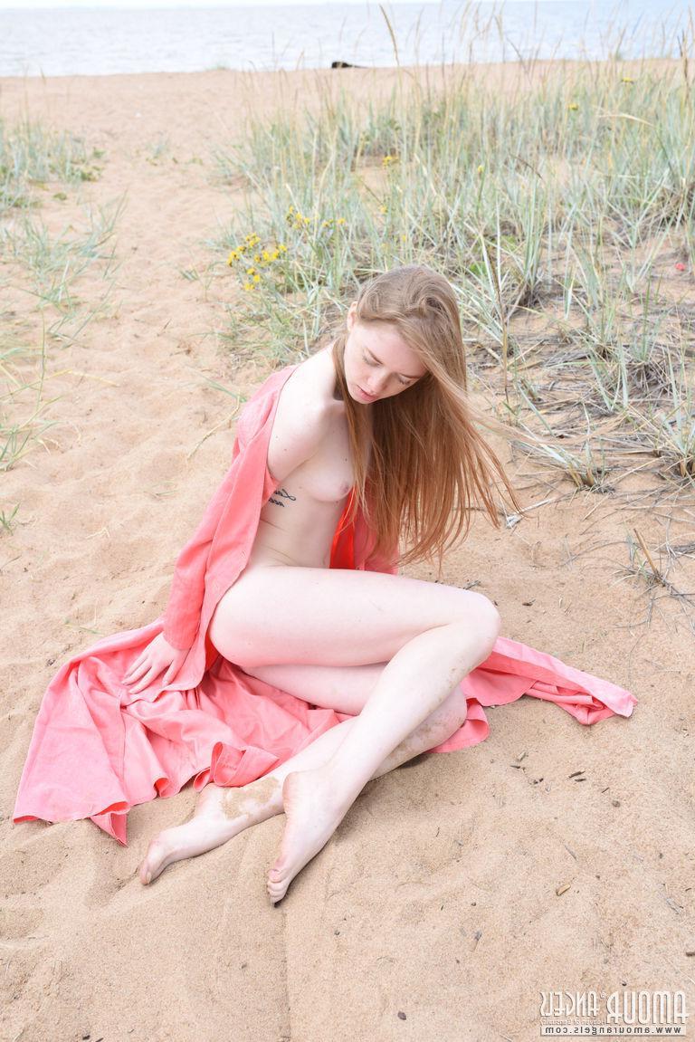 20P Beautiful girl Gerda gives you her tight pussy on the beach