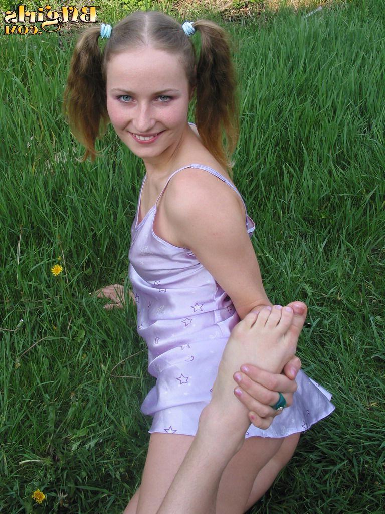 15P Sexy blonde teen sucks her toes on the grass