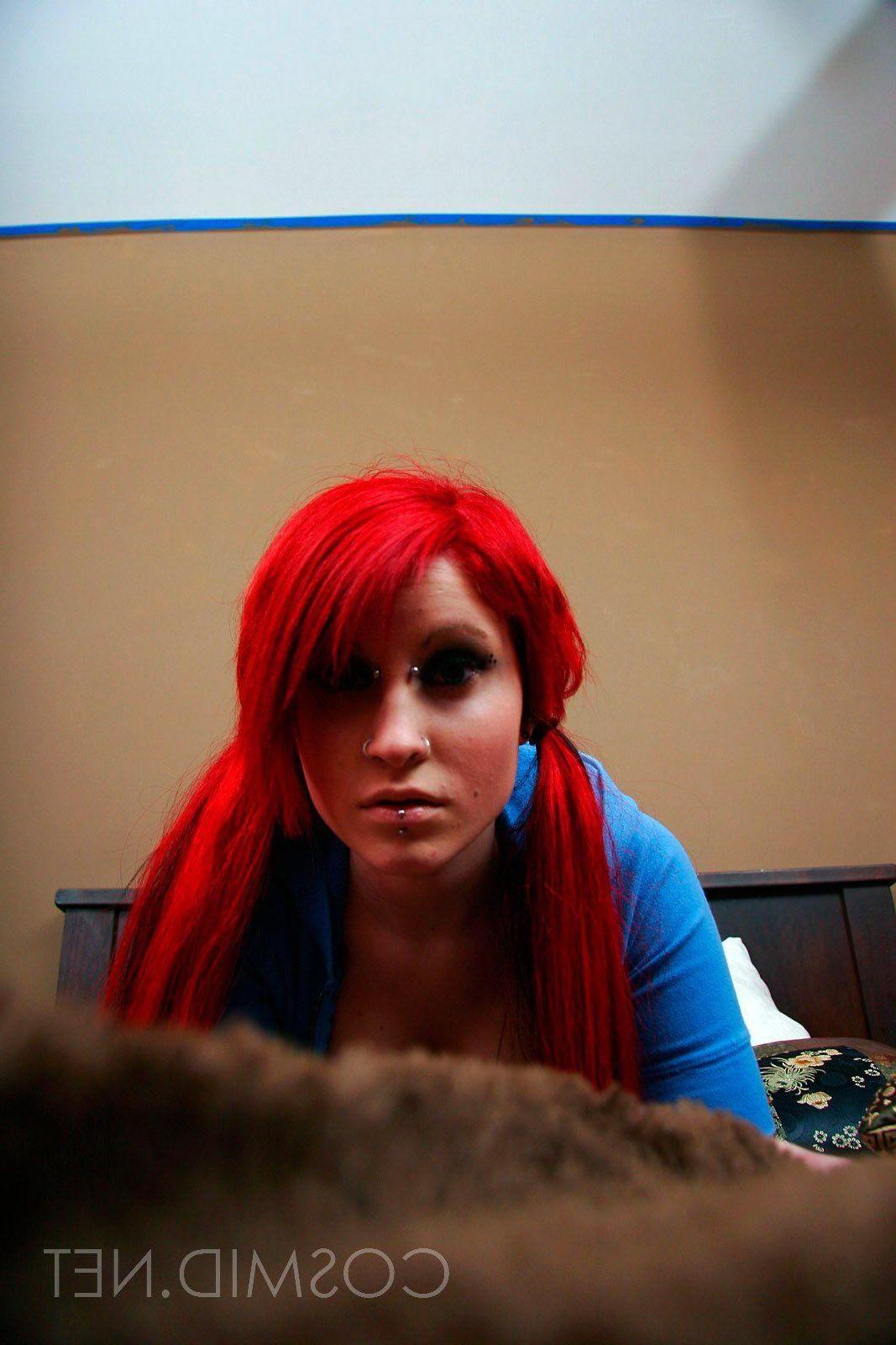 16P Pictures of a busty redhead in pigtails