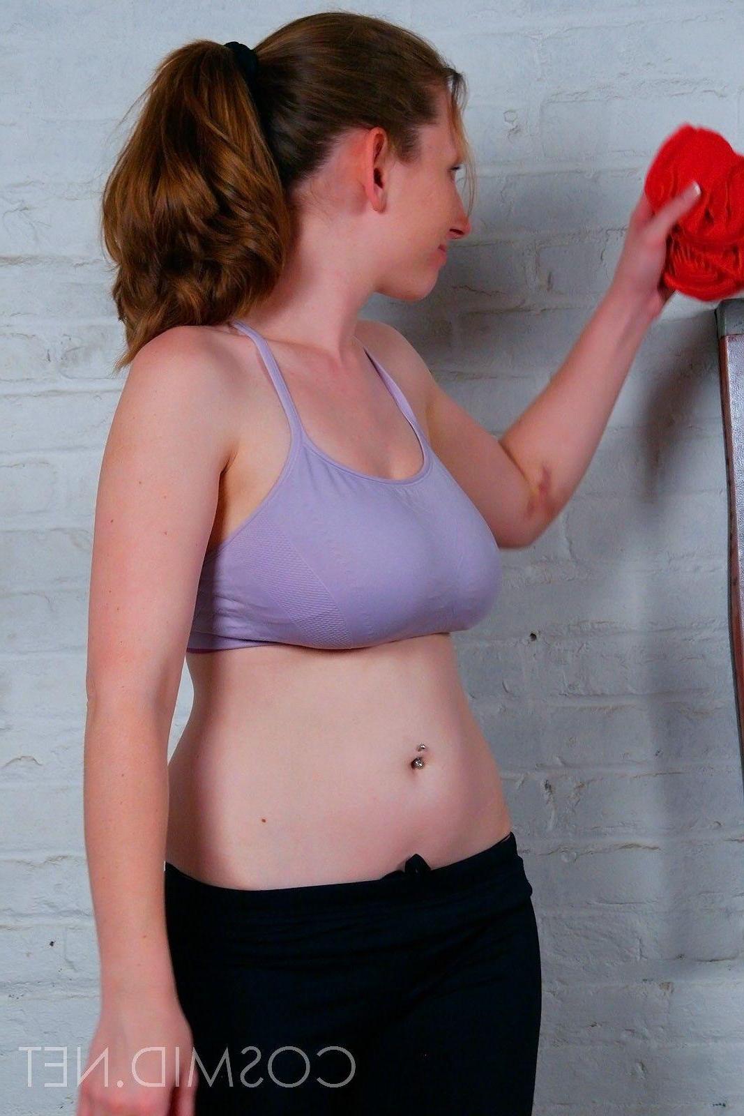 16P Pictures of a busty topless amateur doing yoga
