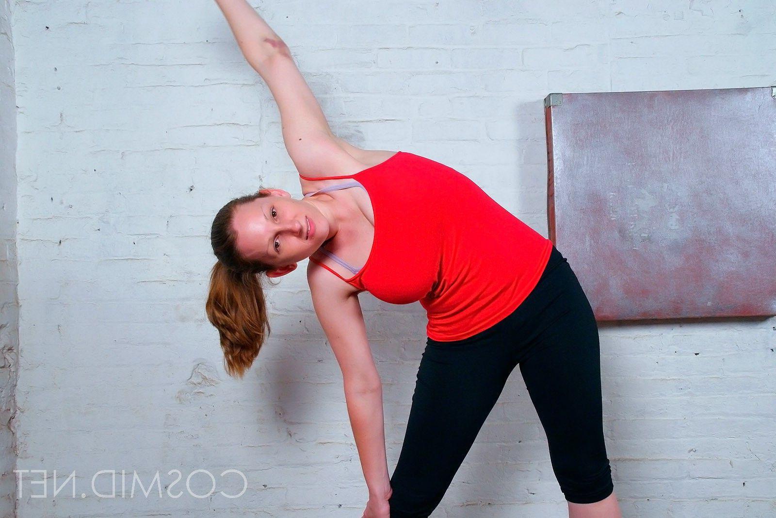 16P Pictures of a busty topless amateur doing yoga