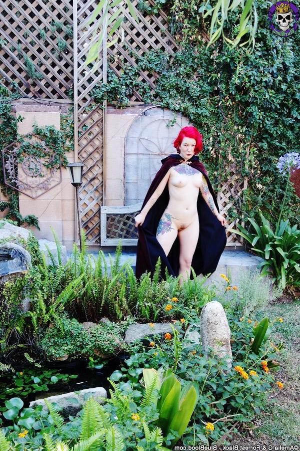 15P Magical pale redhead naked cosplay in the garden