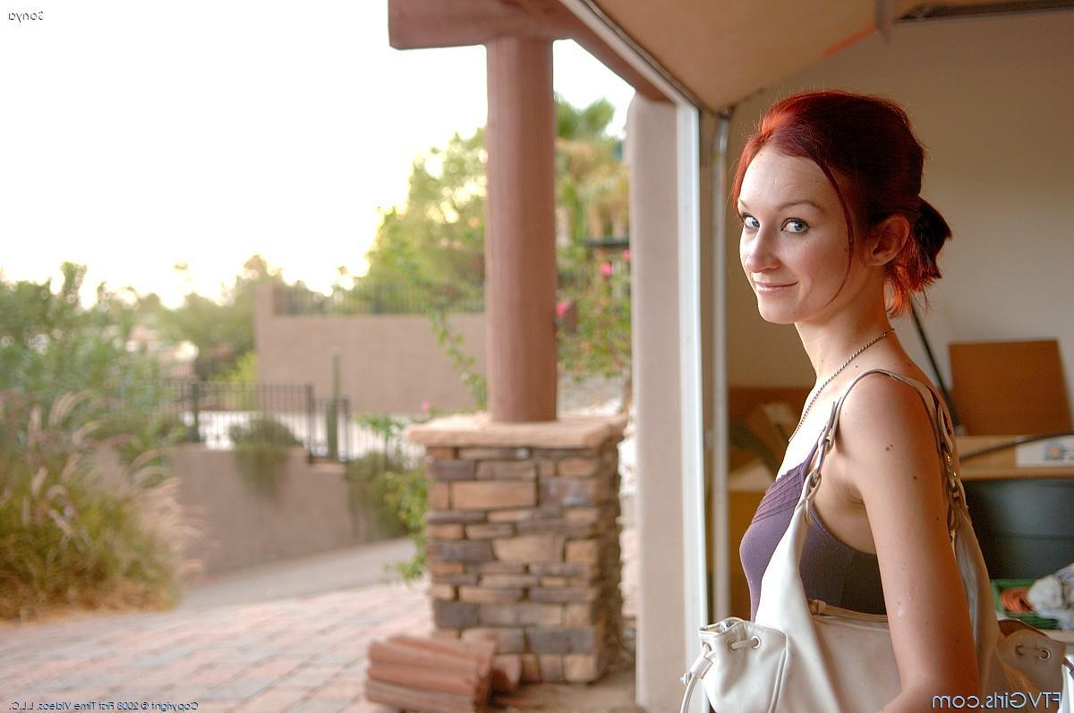 20P Pictures of redhead teen Sonya riding a massive dildo