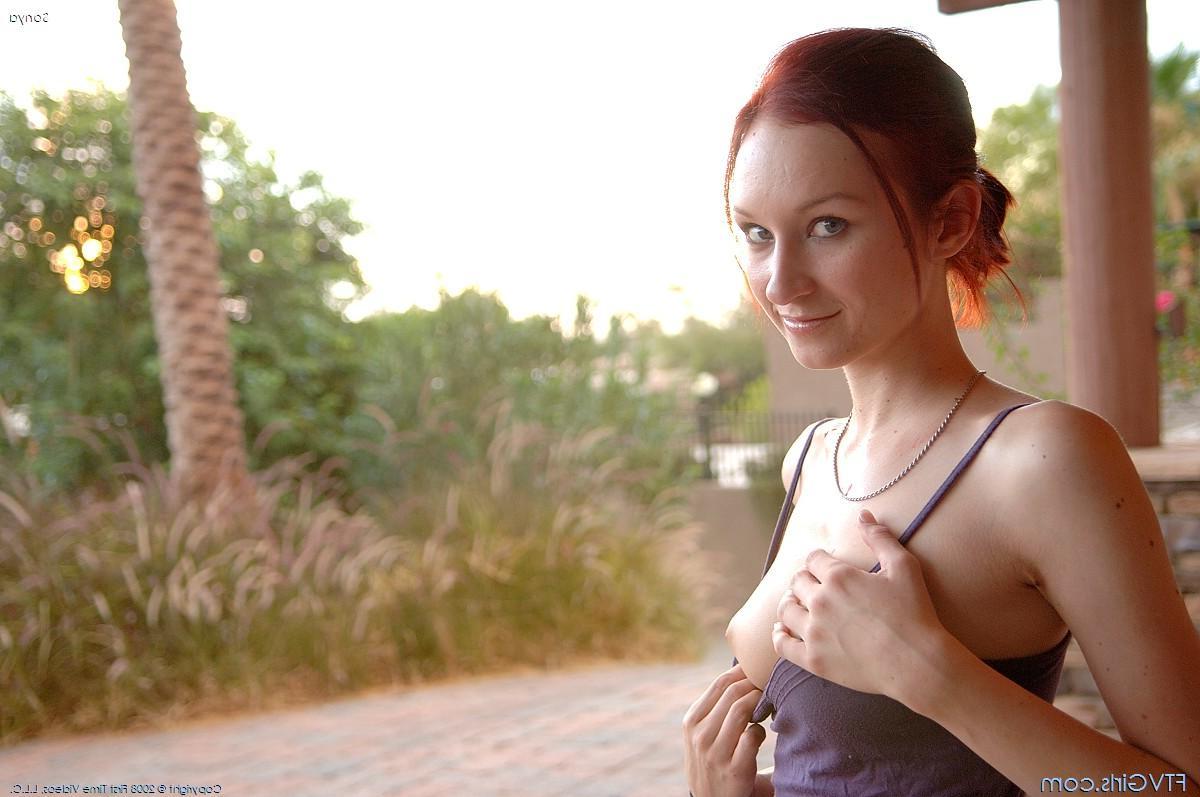 20P Pictures of redhead teen Sonya riding a massive dildo
