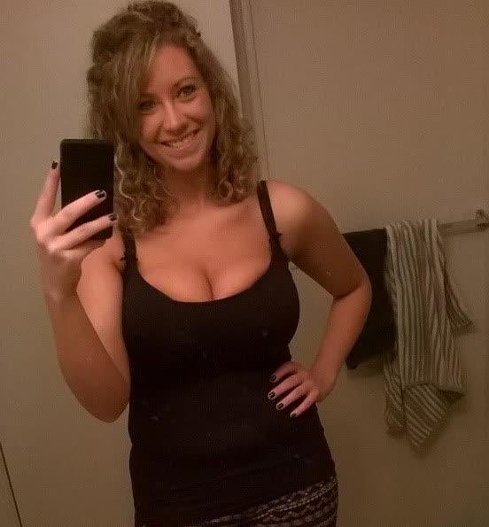14P Heavy-chested amateur honey shows off her fine breasts