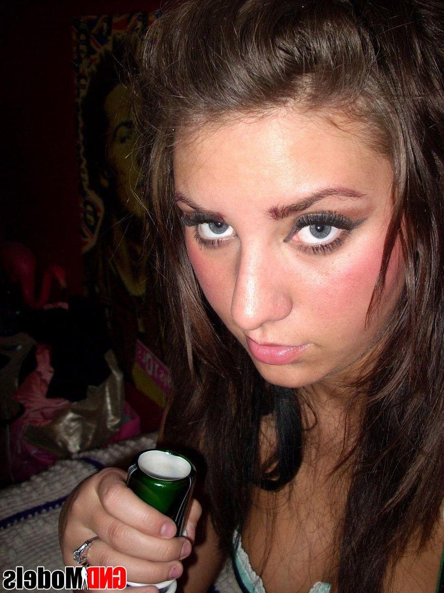 12P Pictures of a sexy brunette girl taking pics of herself