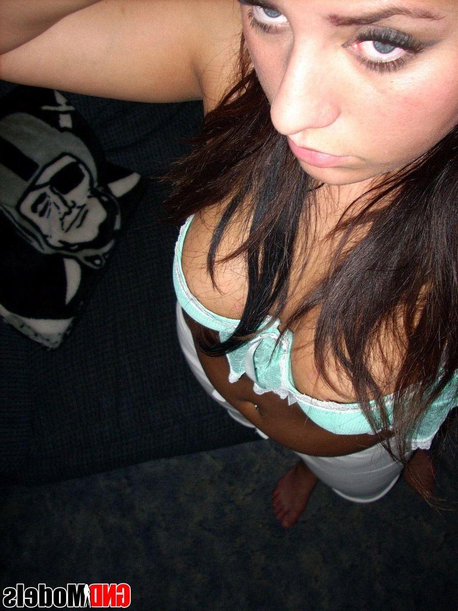 12P Pictures of a sexy brunette girl taking pics of herself