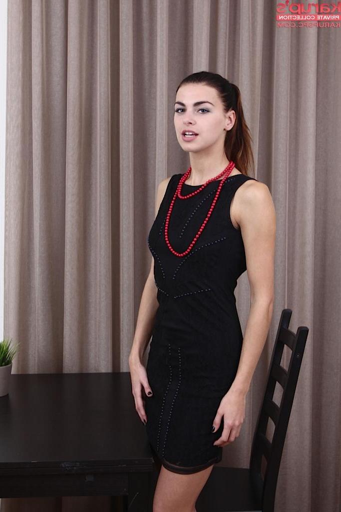15P Brunette hottie Elina Bradley lifts her dress to give you her tight pussy