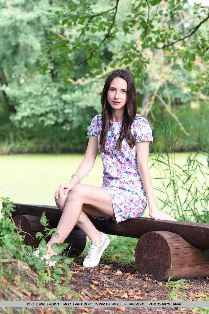 18P Brunette beauty Dama reveals her hot nude body in the woods