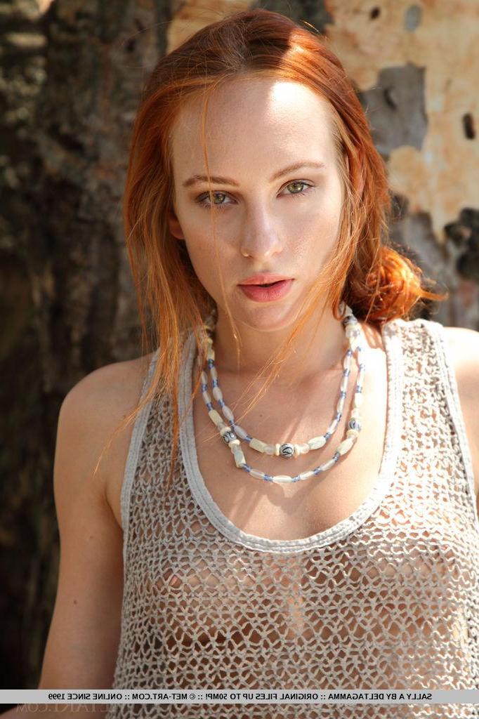 18P Redhead Sally slides out of her little knit dress to present her perfect body