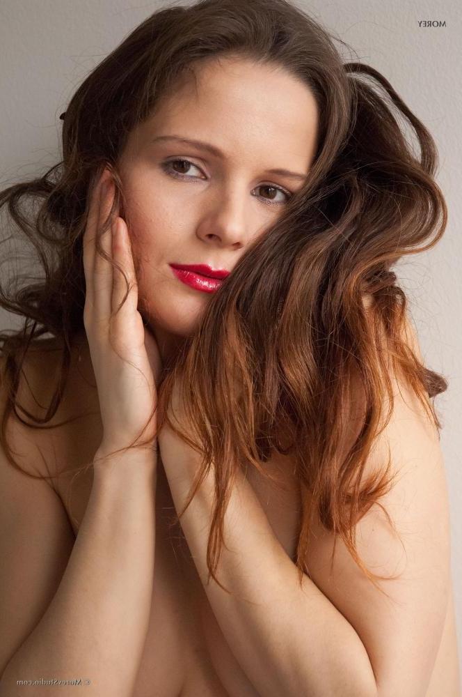 10P Brunette model Carol J shows you her nude body in bed