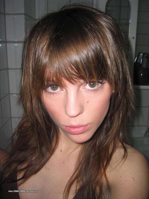 15P Hot chick flaunting her body in a sexy white nightgown