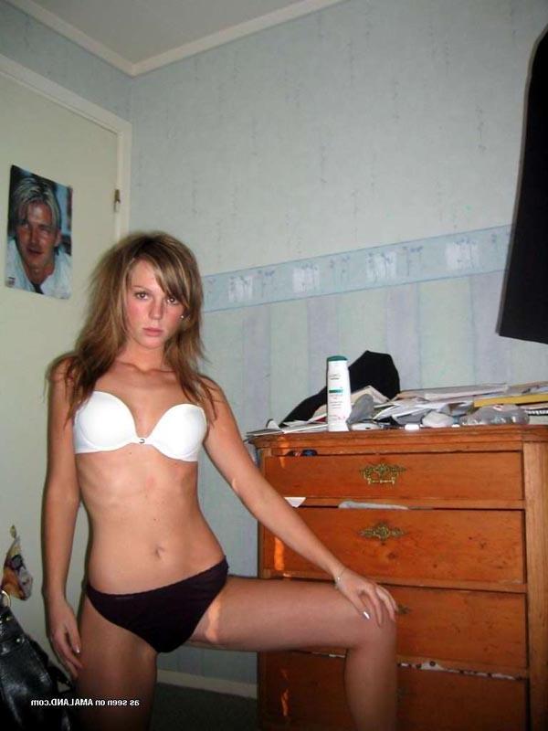 15P Hot chick flaunting her body in a sexy white nightgown