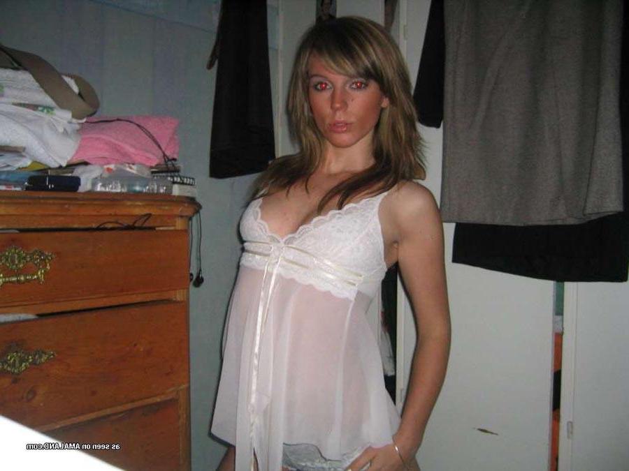 15P Hot chick flaunting her body in a sexy white nightgown