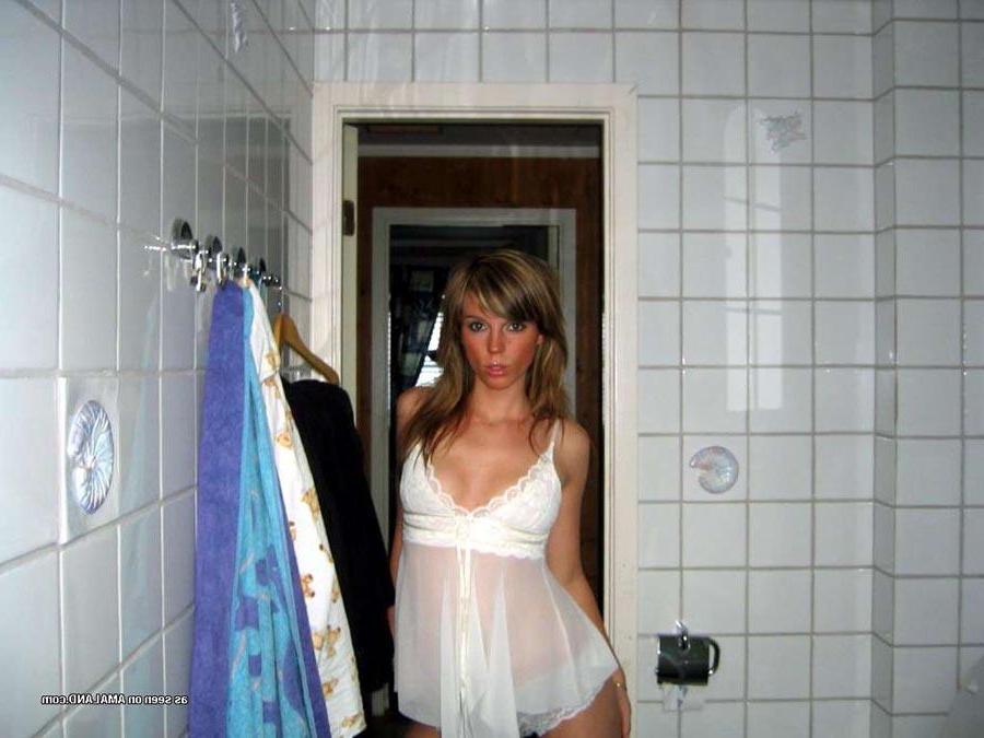 15P Hot chick flaunting her body in a sexy white nightgown