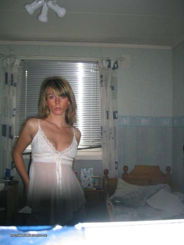 15P Hot chick flaunting her body in a sexy white nightgown