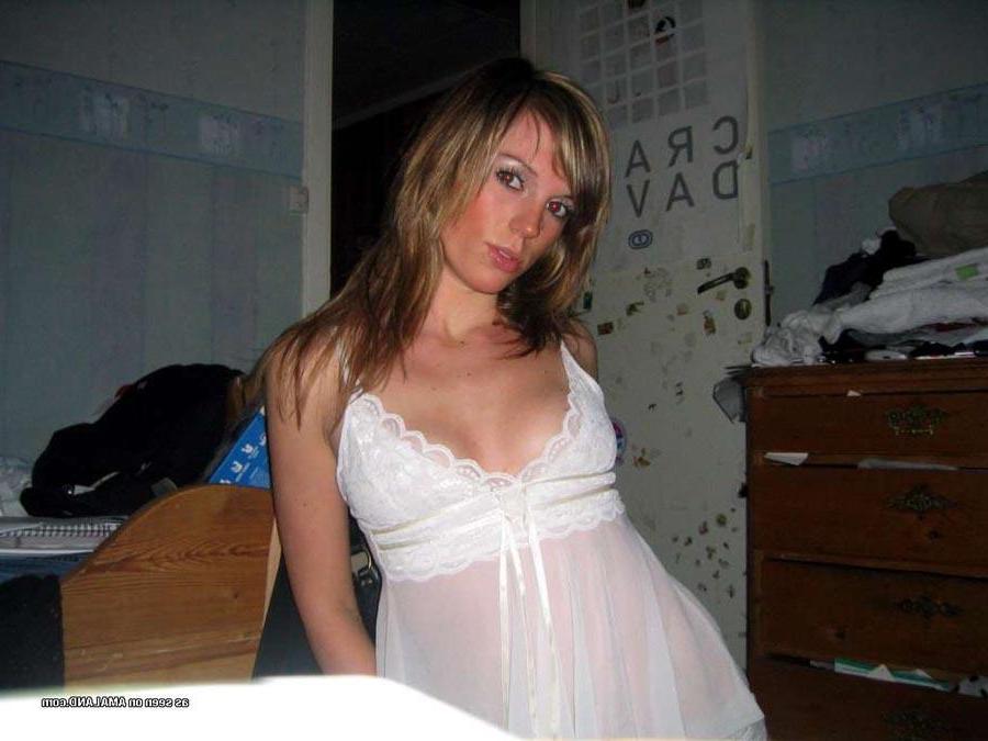15P Hot chick flaunting her body in a sexy white nightgown