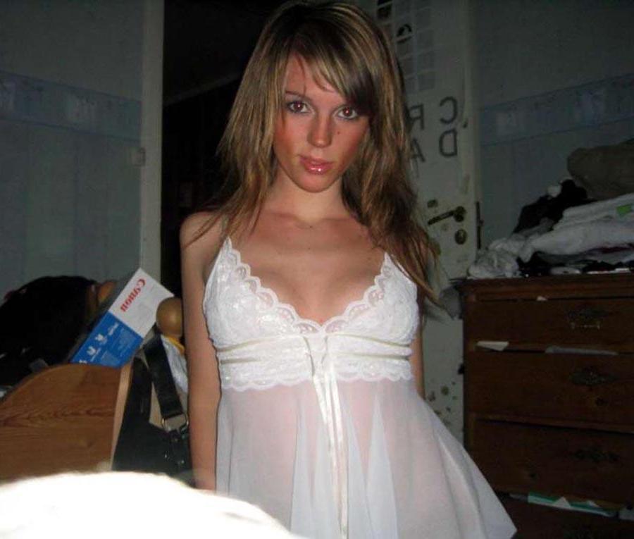 15P Hot chick flaunting her body in a sexy white nightgown