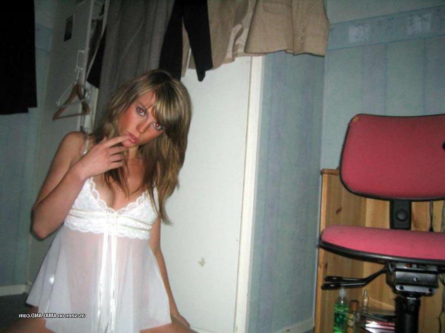 15P Hot chick flaunting her body in a sexy white nightgown