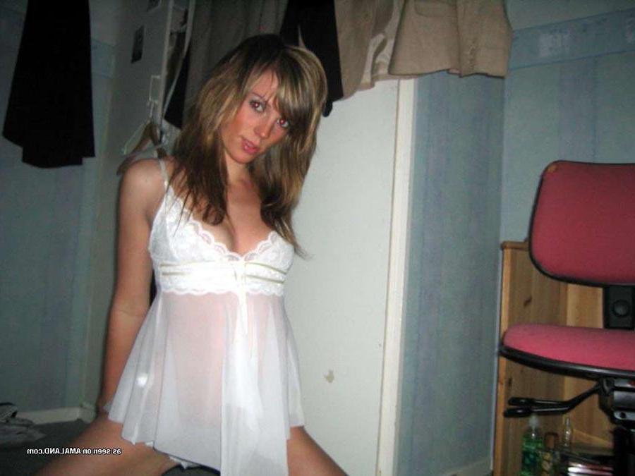 15P Hot chick flaunting her body in a sexy white nightgown