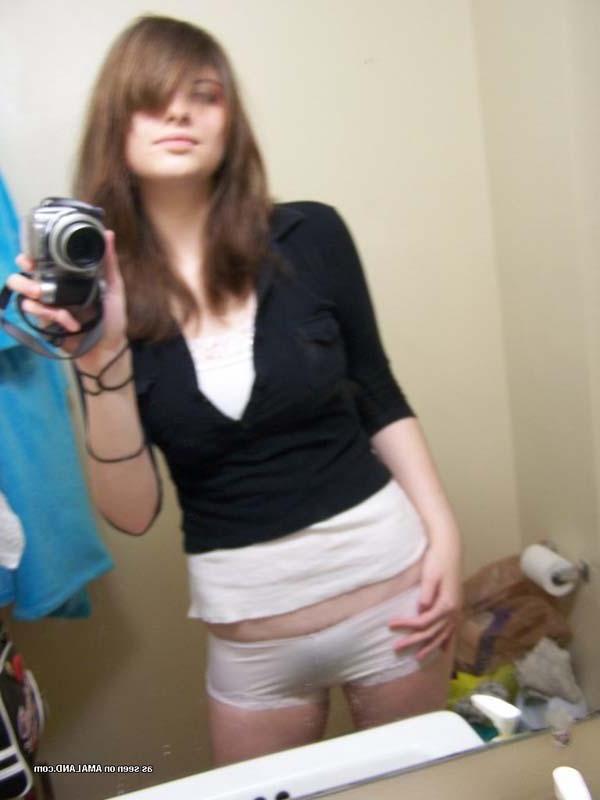 16P Pictures of a hot brunette girl taking pics of herself