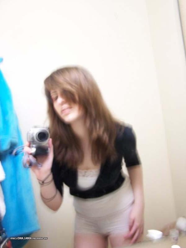 16P Pictures of a hot brunette girl taking pics of herself