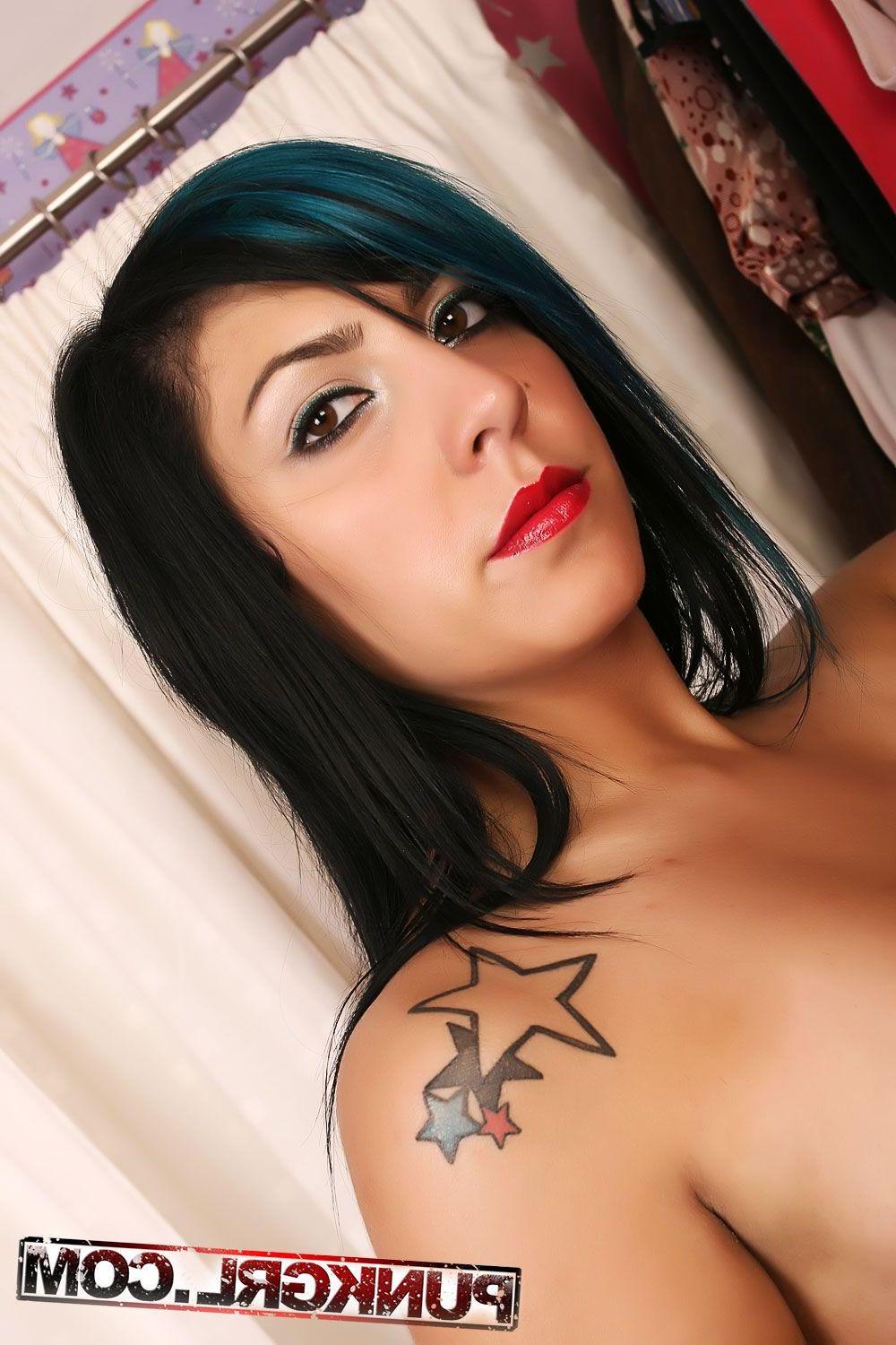 20P Pictures of teen punk Dolly showing her busty body