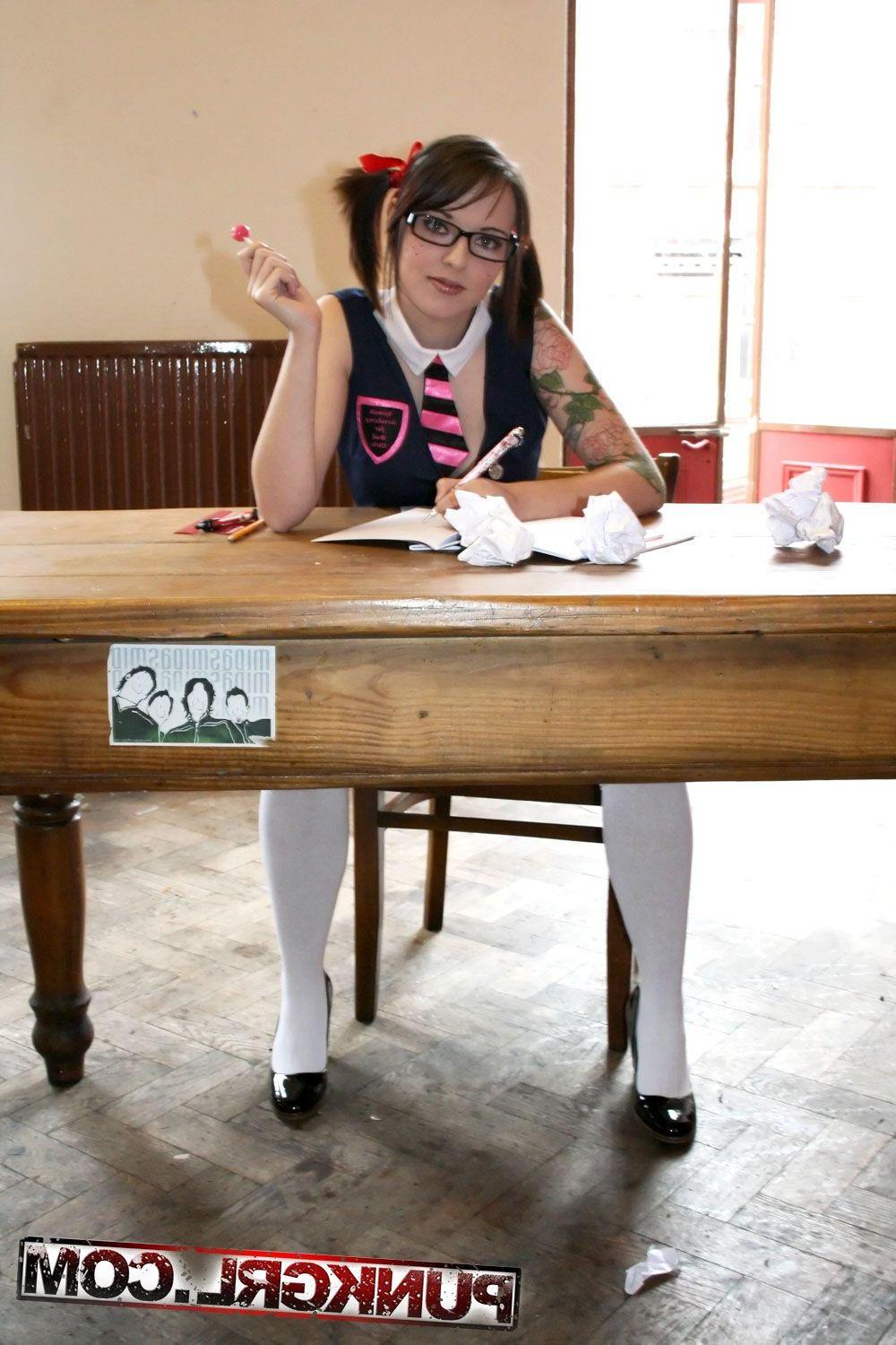 20P Pictures of a hot punk schoolgirl with a lollipop